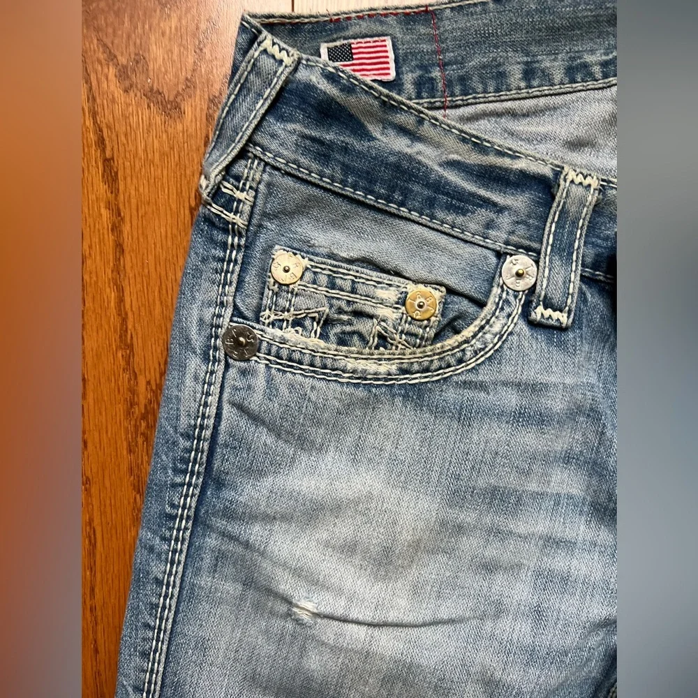 • True Religion Light Blue Distressed Men’s Jeans